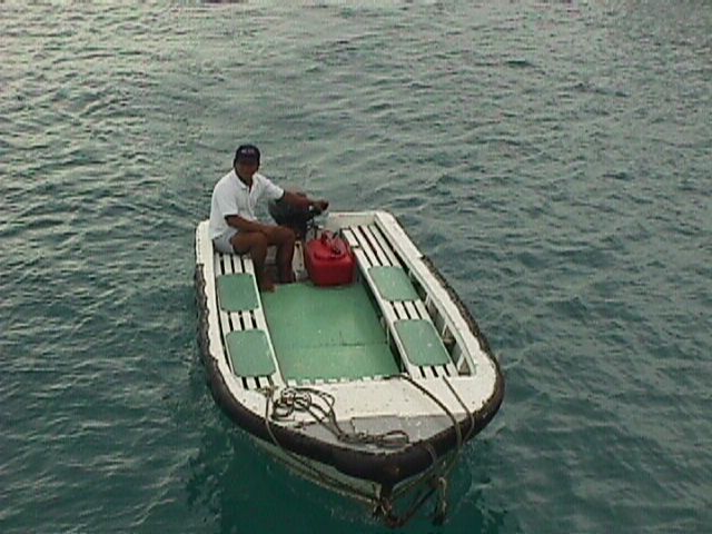 Boatman Carlos in panga